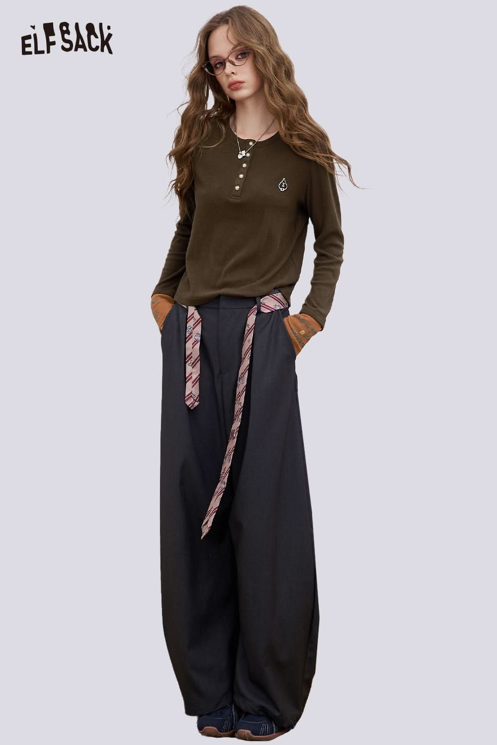 ELFSACK soft spliced sleeve long sleeve tshirt in olive green paired with wide-leg pants