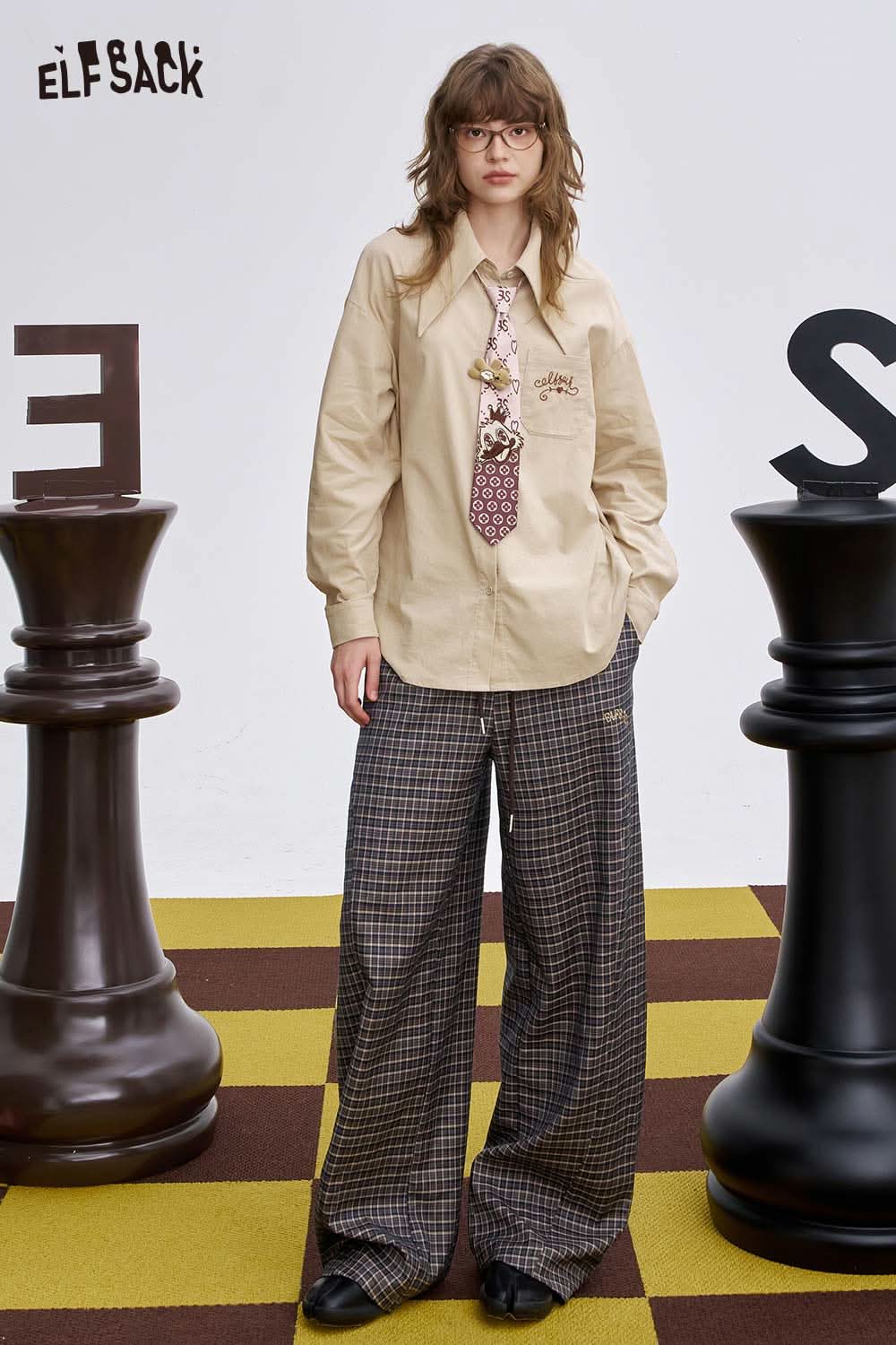 ELFSACK soft stripe embroidered wide leg pants styled with a beige shirt and tie, featuring a relaxed fit