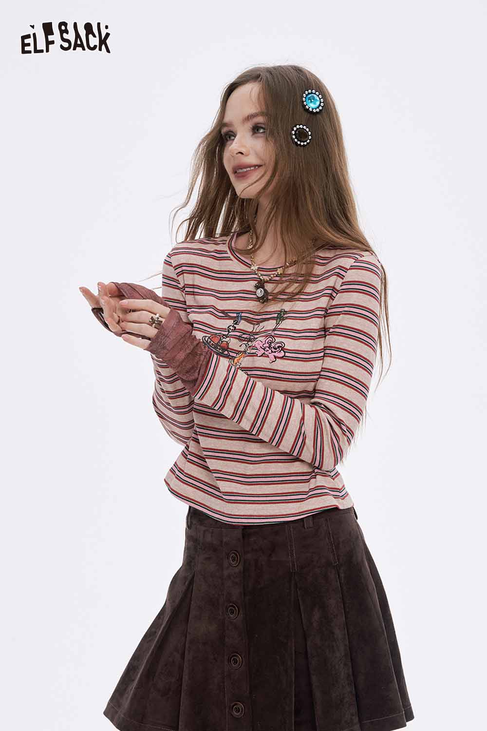 ELFSACK soft stripe graphic long sleeve tshirt with playful design on a model featuring a stylish appearance