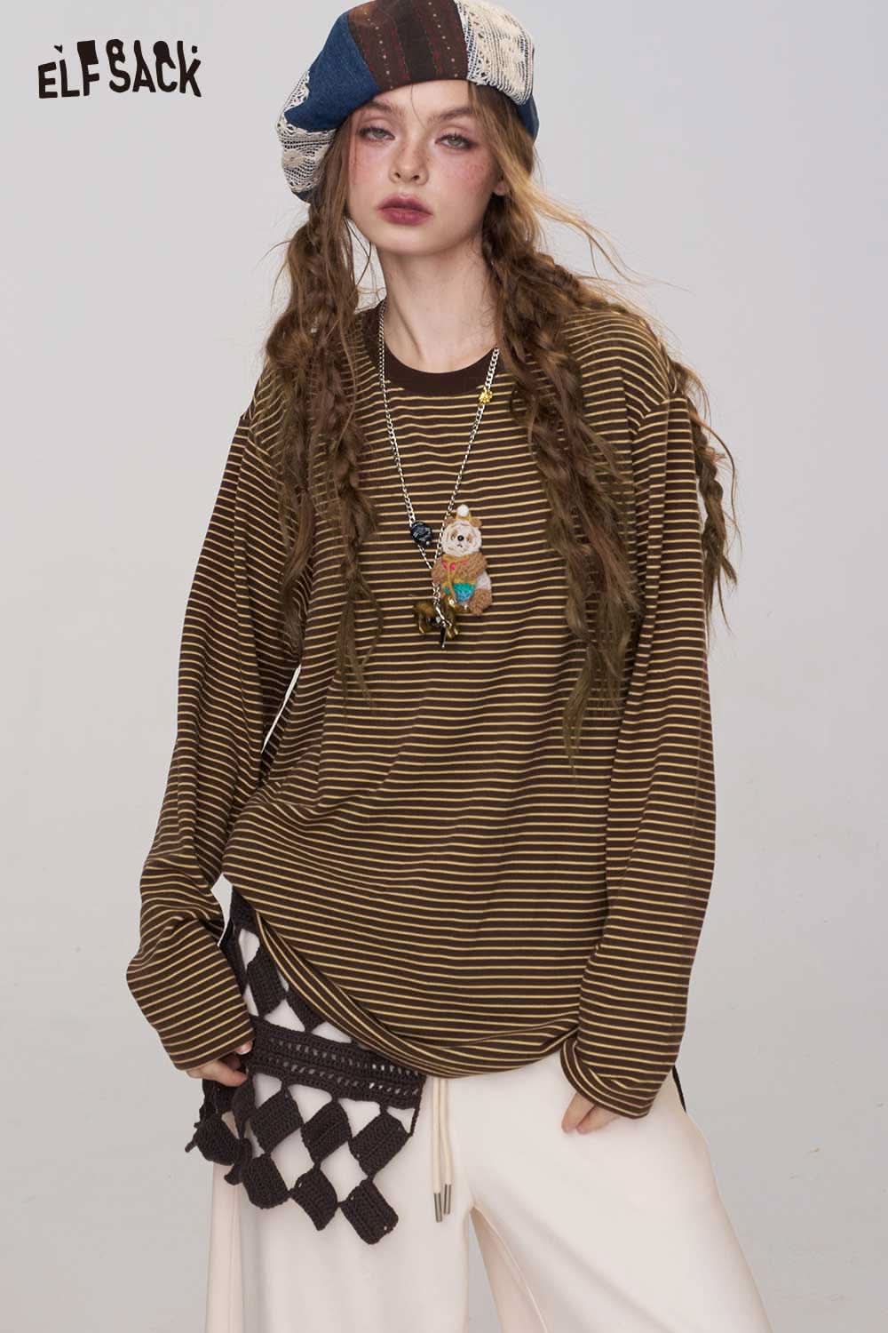 ELFSACK soft striped long sleeve tee in brown and black stripes, styled with accessories for a casual look