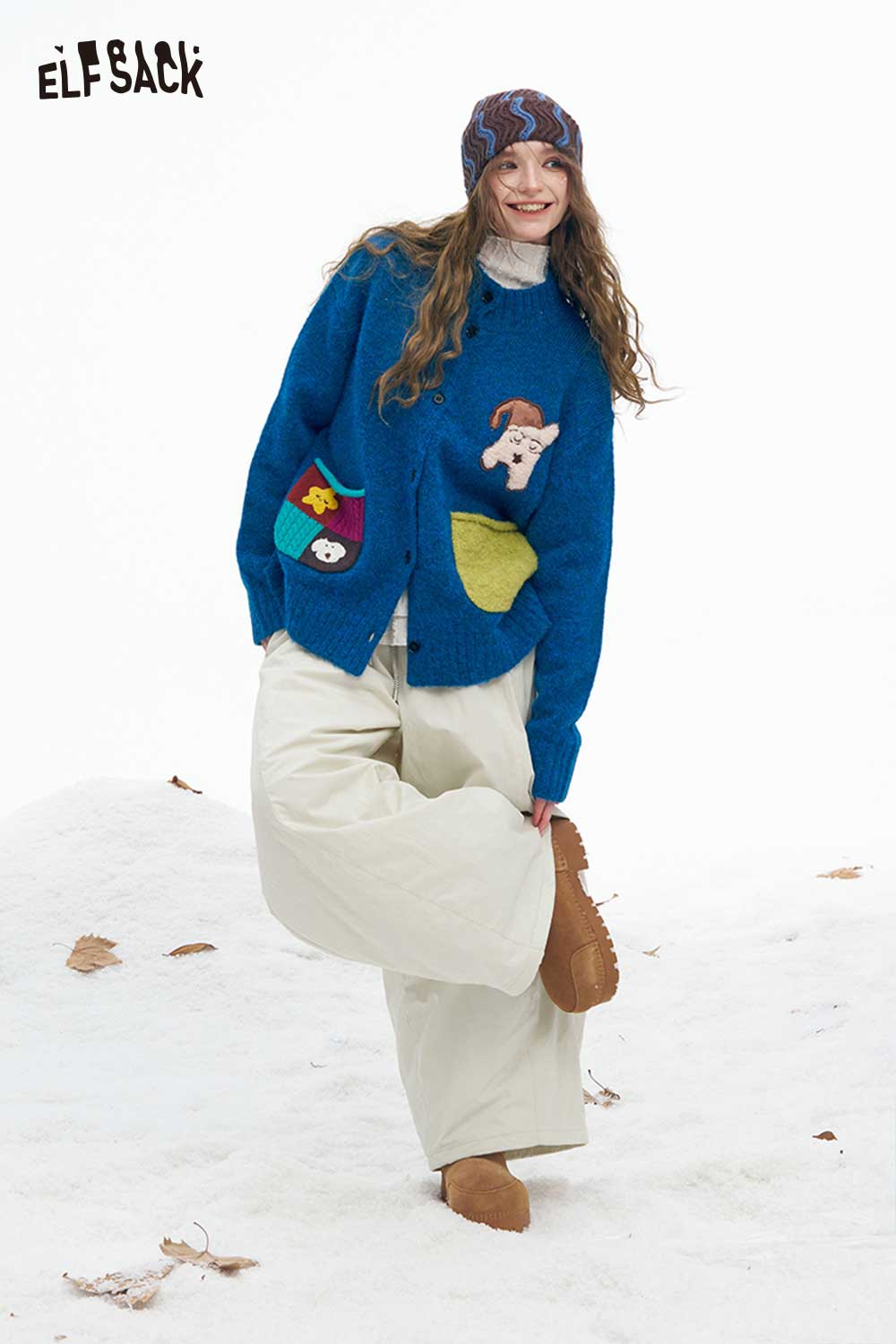 ELFSACK soft wide leg pants for women in a light color styled with a cozy sweater and winter accessories