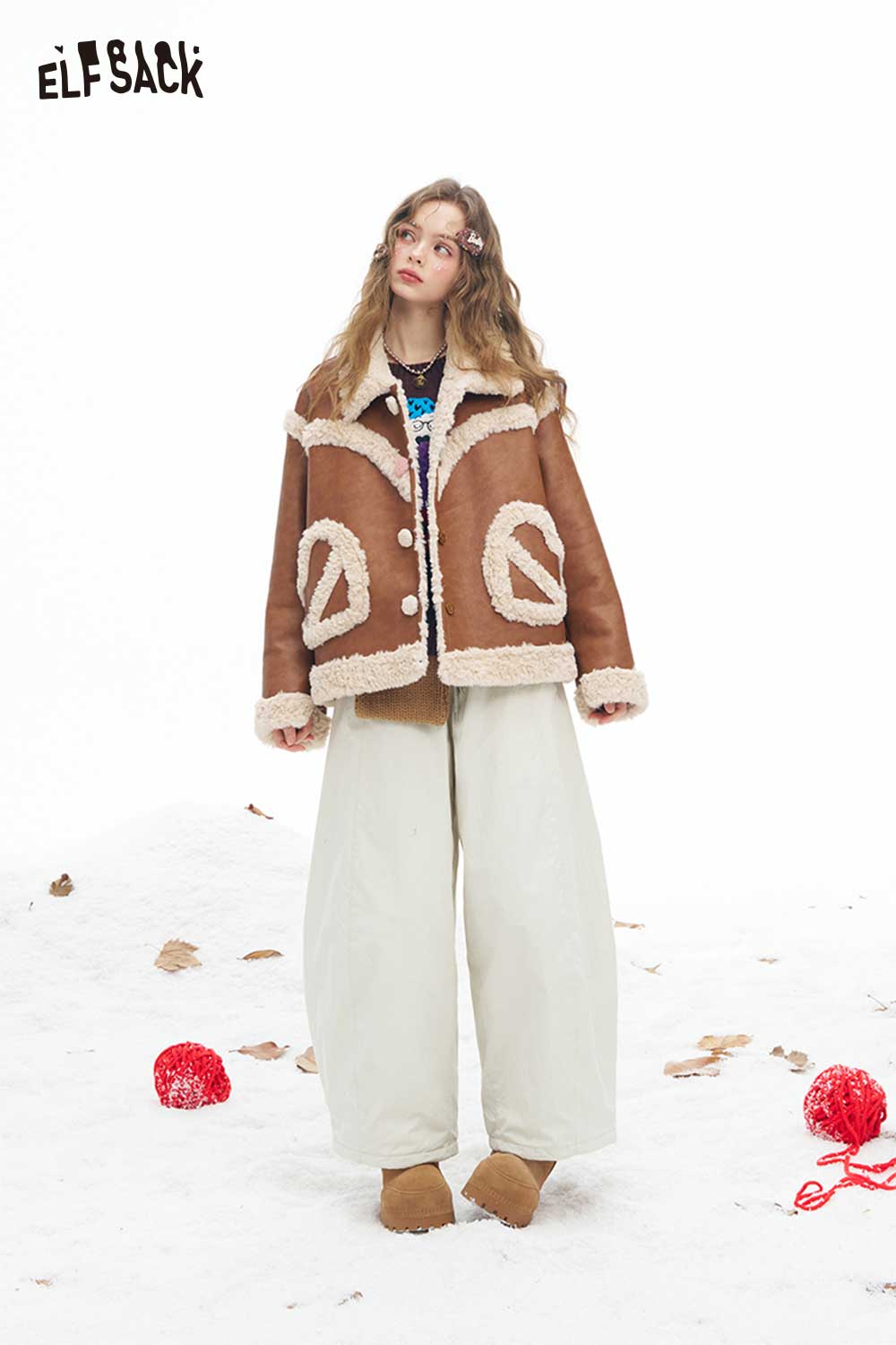 ELFSACK soft wide leg pants for women in light color, styled with a cozy jacket and winter accessories