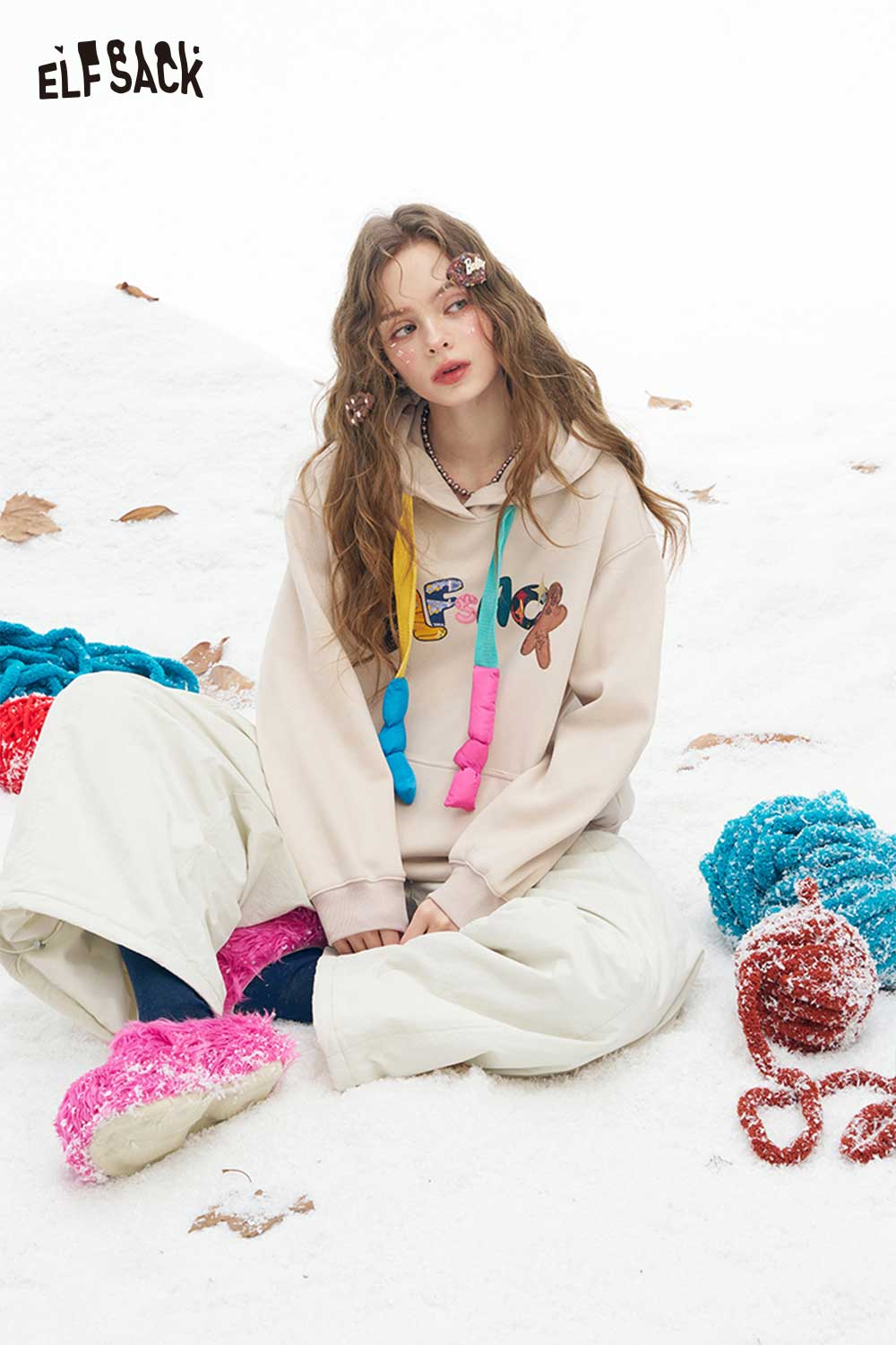 ELFSACK soft wide leg pants for women styled with a cozy hoodie in a winter setting