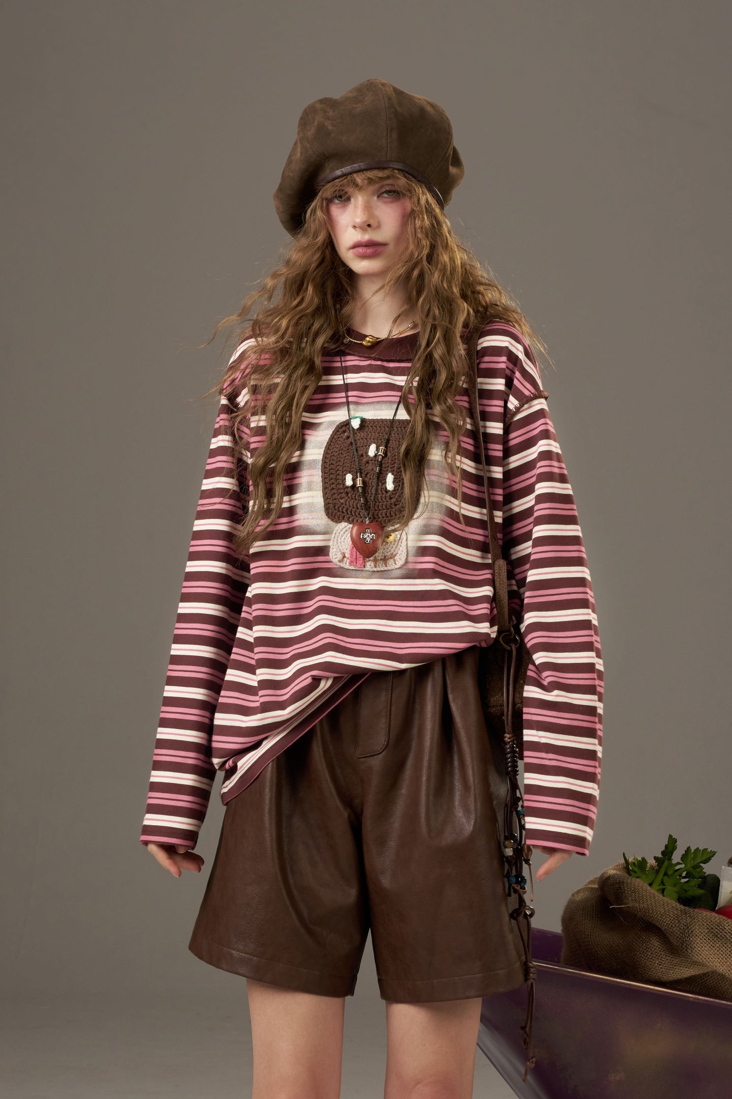 ELFSACK soft yarn sweatshirt for women in striped design featuring a playful graphic print