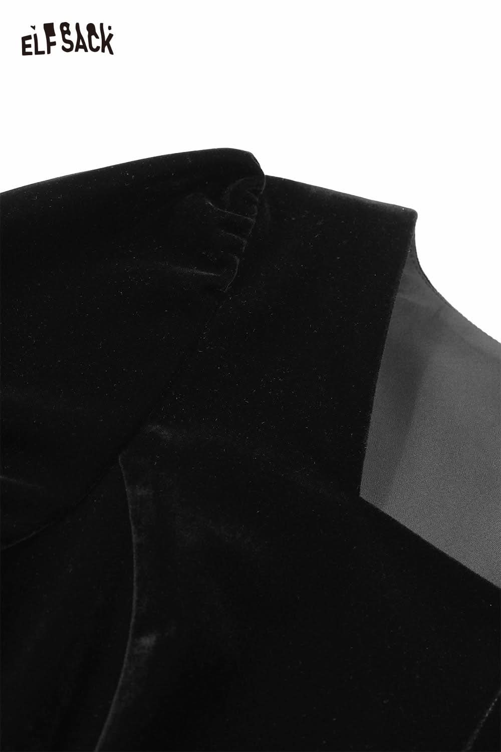 Close-up of the square neck puff sleeve dress by ELFSACK showcasing soft black fabric and intricate detailing