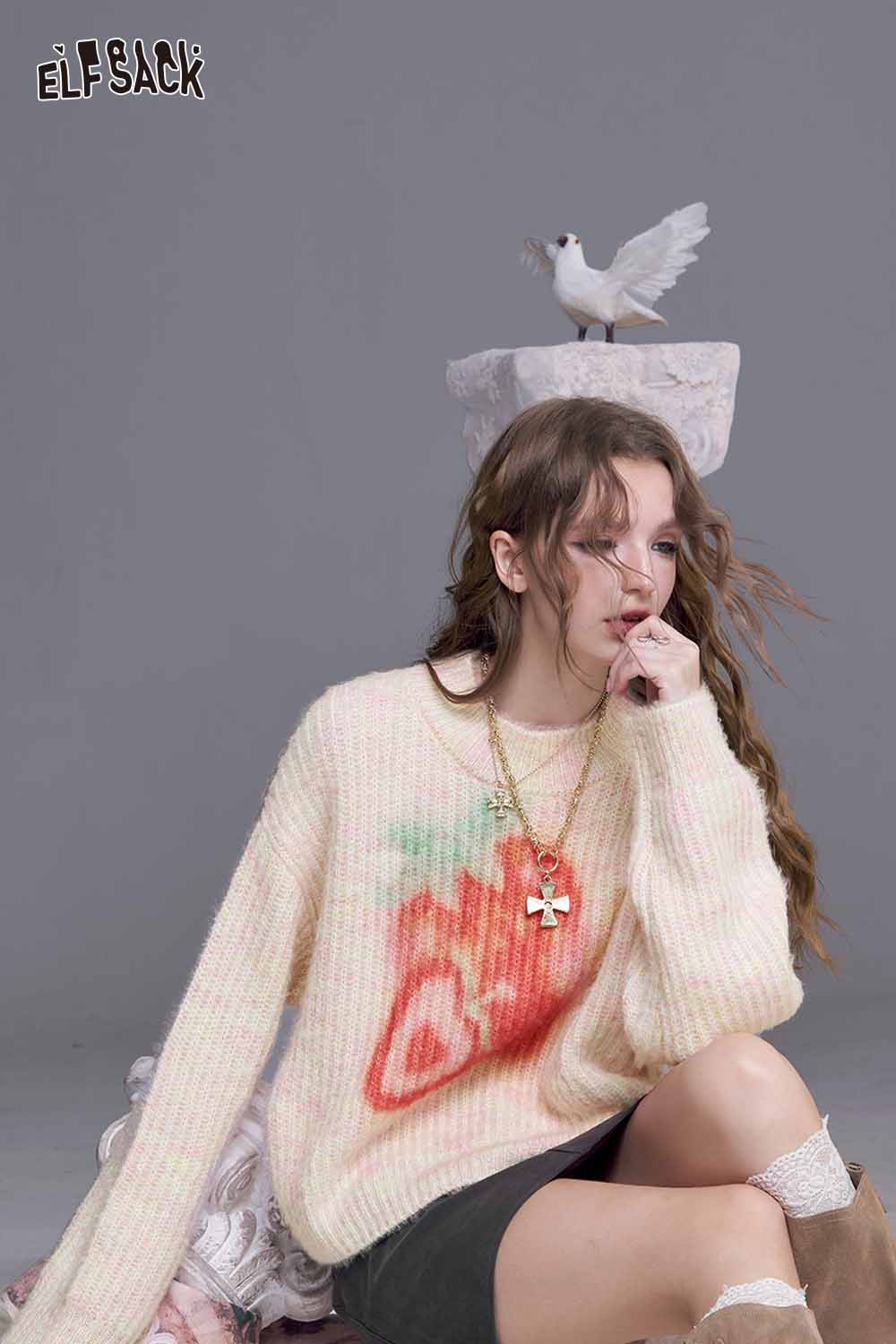 ELFSACK strawberry graphic knit sweater in soft pastel colors, perfect for cozy casual outfits