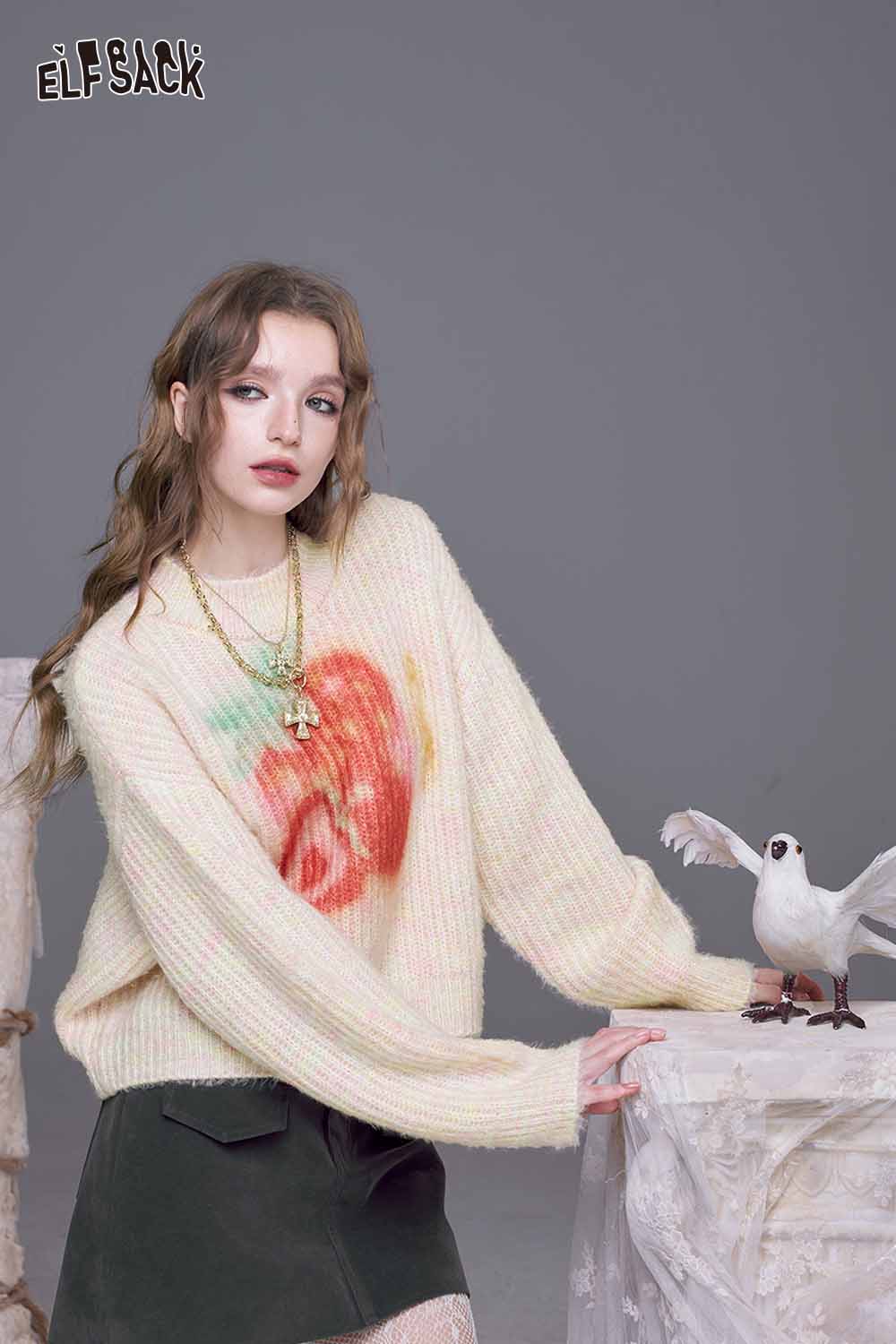 ELFSACK strawberry graphic knit sweater with a cozy design and vibrant fruit print