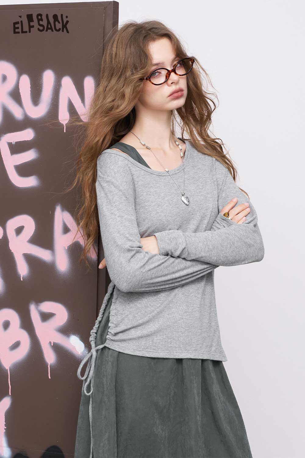 ELFSACK gray stretch knit two piece set featuring long sleeve top with side ties over layered dress