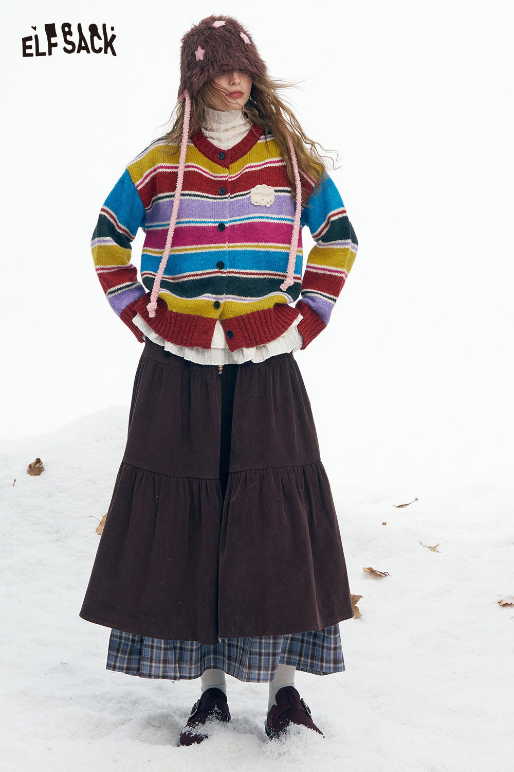 ELFSACK stripe embroidery button sweater in vibrant colors layered over a skirt for a stylish winter look