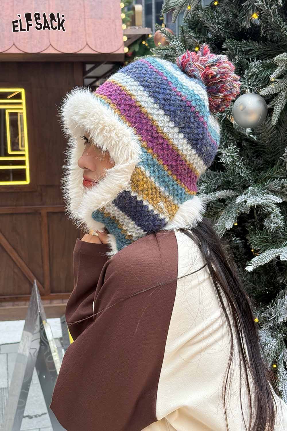 ELFSACK Striped color block ear flap beanie with a multicolor design and faux fur lining for warmth