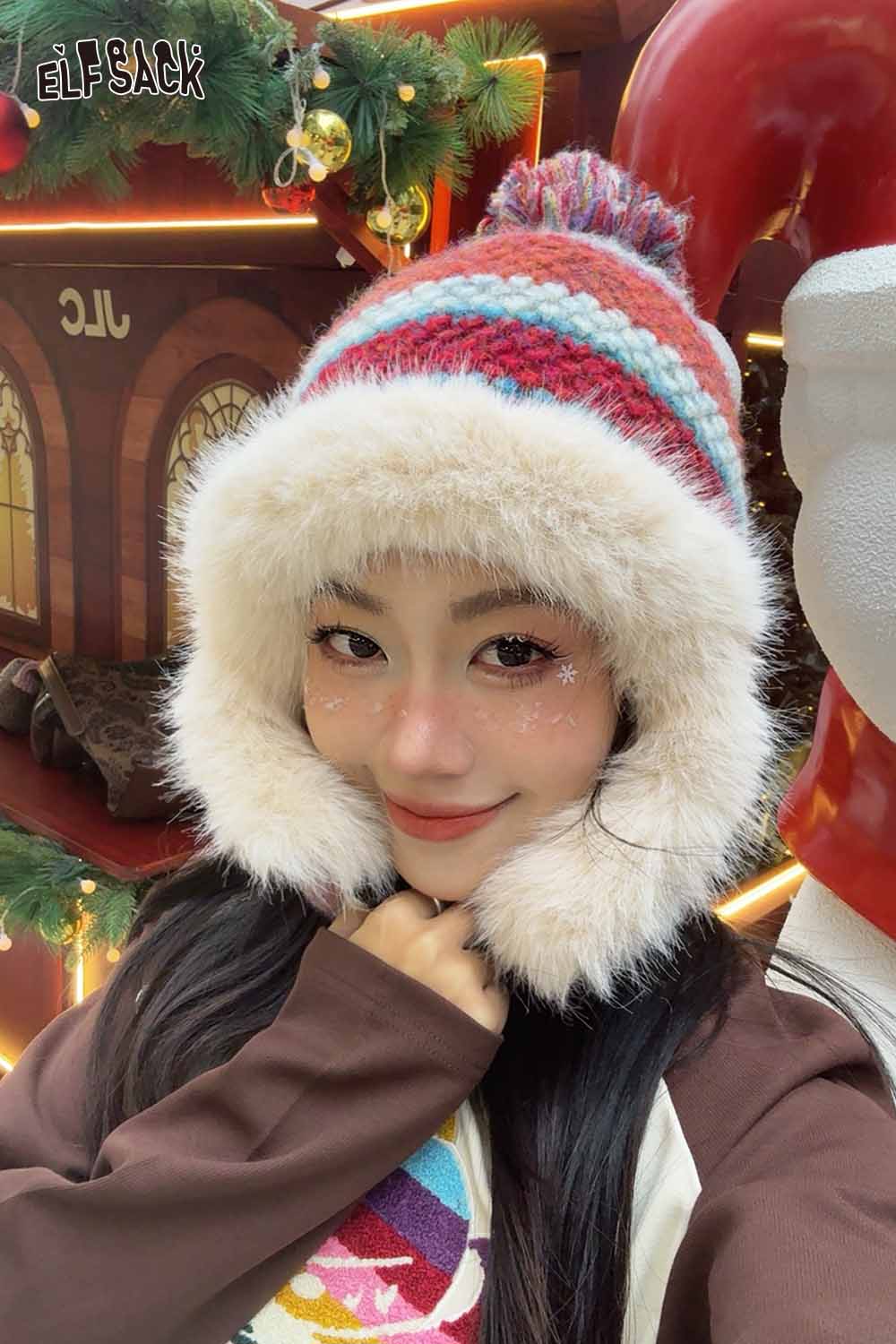 ELFSACK striped color block ear flap beanie with fluffy lining and a pom pom on top