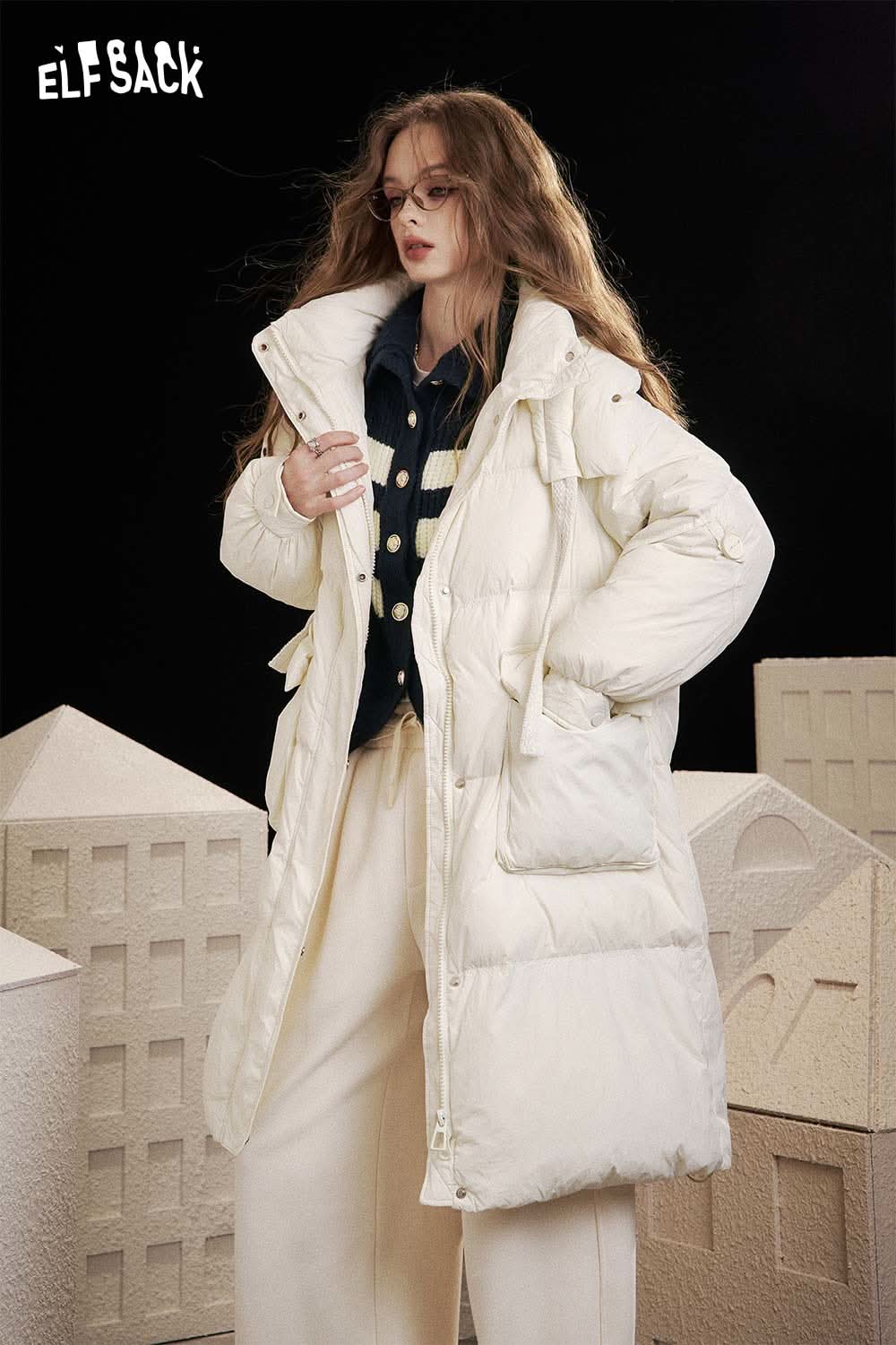 ELFSACK striped knit stand collar cardigan styled under a fluffy white puffer coat