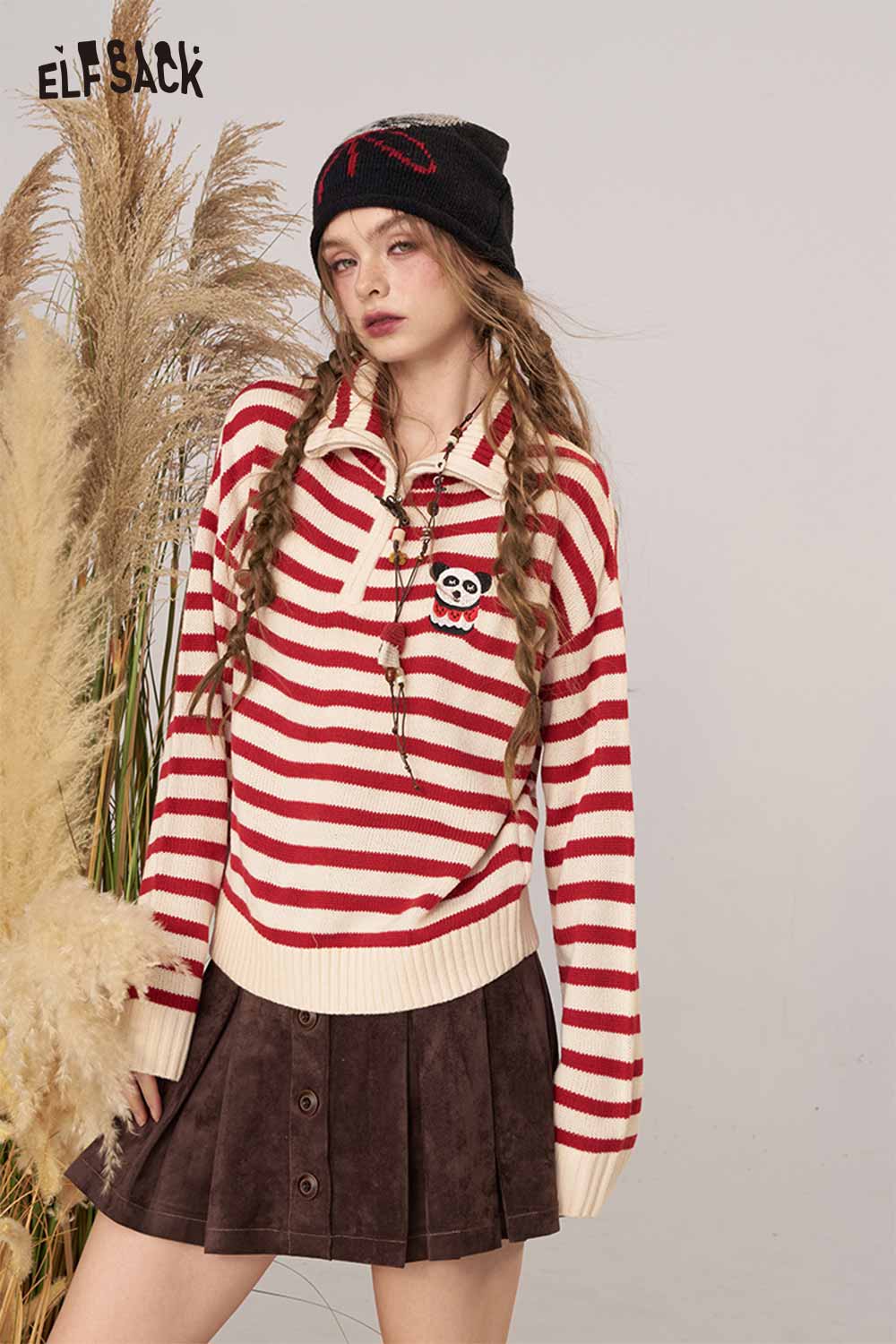 Striped panda graphic sweater women by ELFSACK in red and cream with a playful aesthetic, perfect for casual wear.