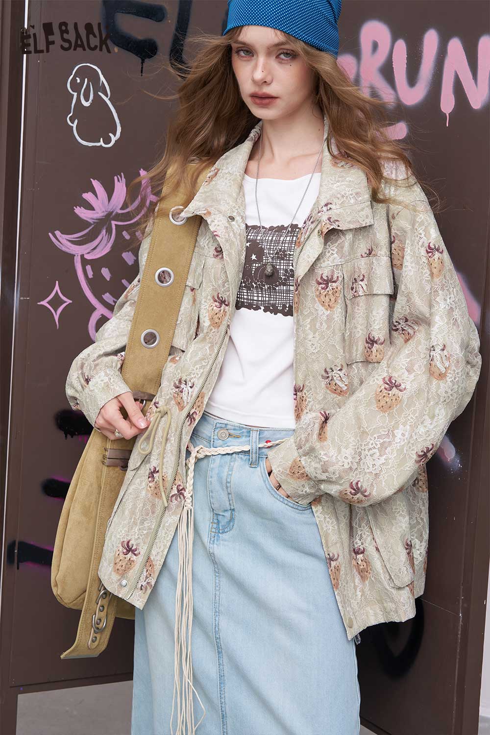 ELFSACK embroidered denim jacket for women in beige floral pattern oversized styling on model