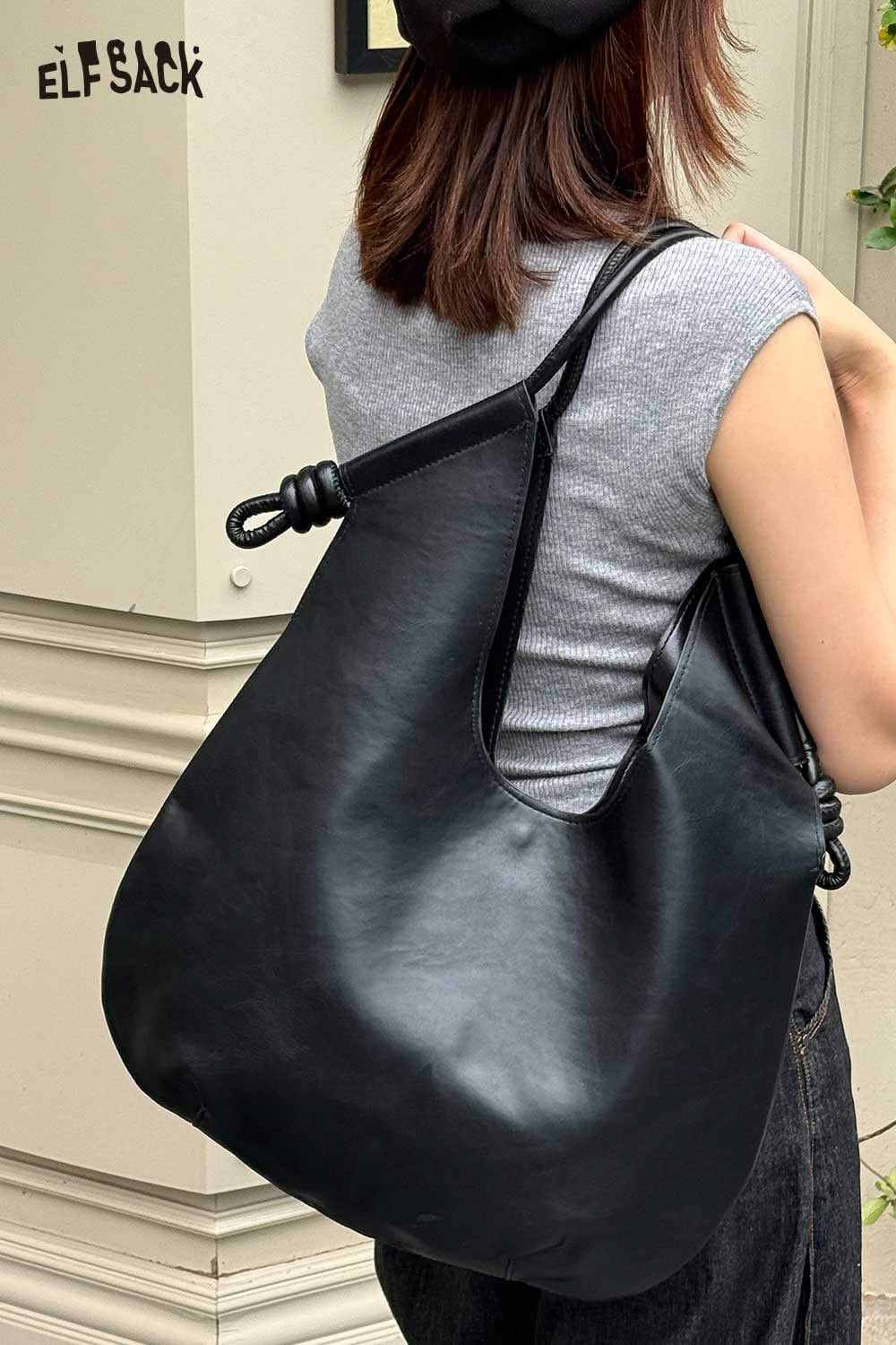 Elegant structured PU tote bag for women with a sleek design and comfortable shoulder strap