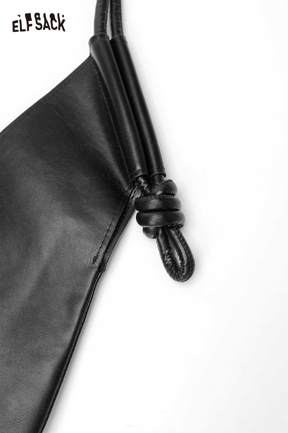 Close-up of a structured PU tote bag for women by ELFSACK featuring unique knot detailing on the handle
