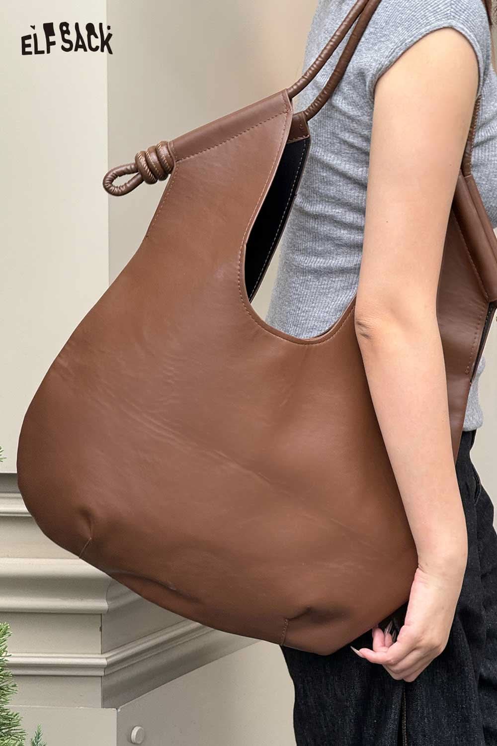 Brown structured PU tote bag for women with unique handle design by ELFSACK