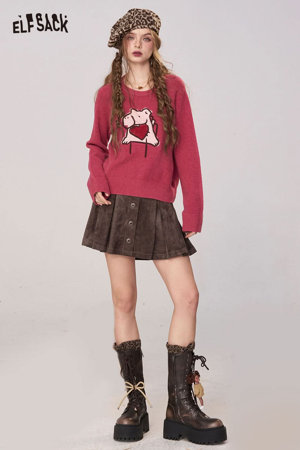 ELFSACK suede A-line mini skirt paired with a cute frog graphic sweater and stylish boots