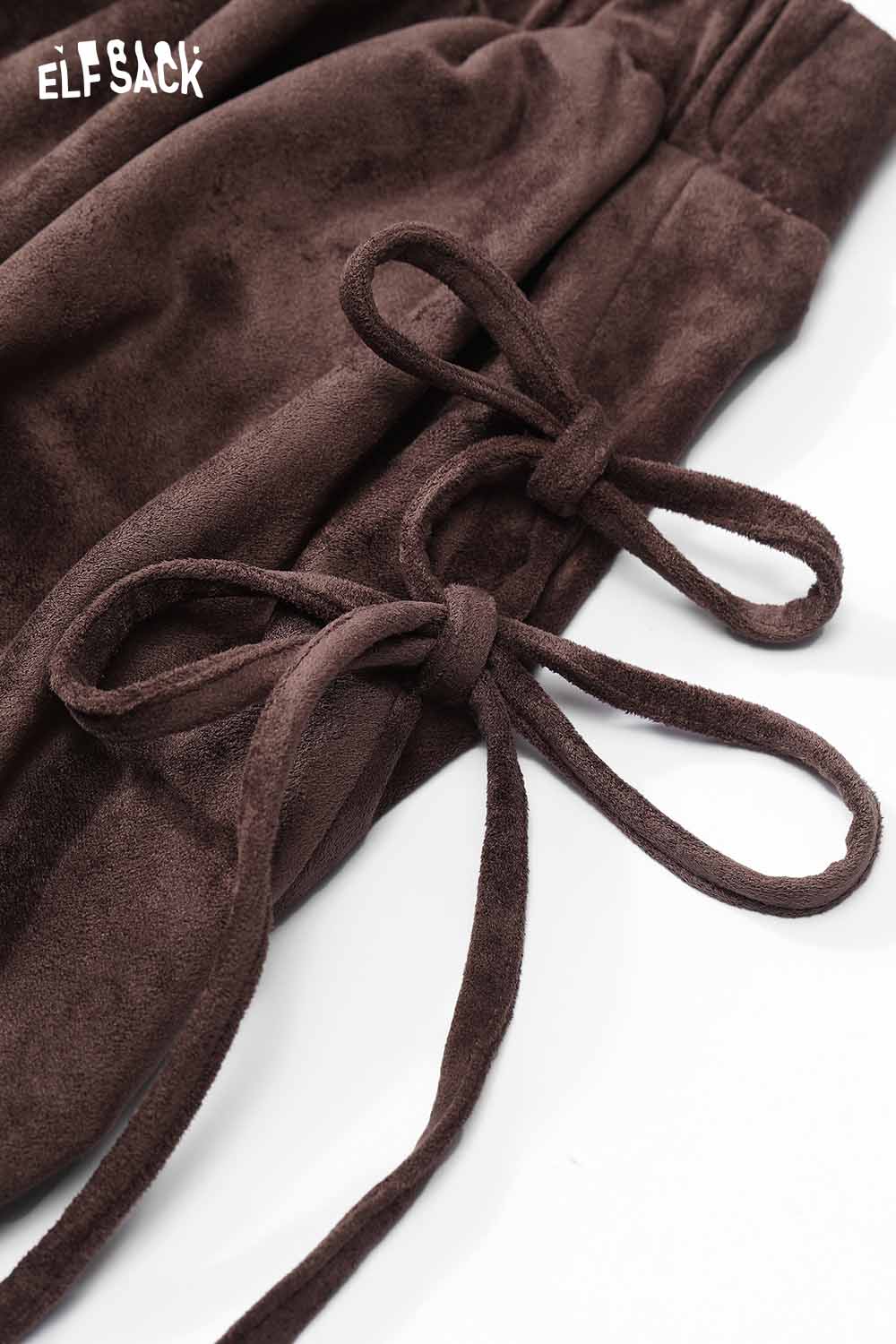 Close-up of ELFSACK suede bloomer mini skirt with soft texture and drawstring details