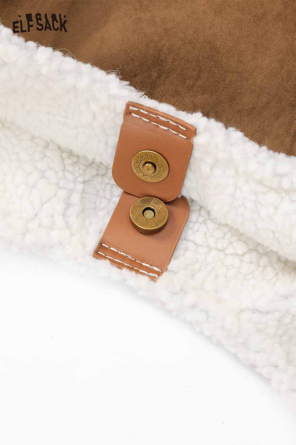 Close-up of ELFSACK suede lambswool crossbody bag showing soft texture and button closure