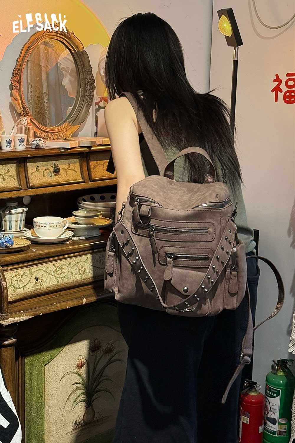 ELFSACK suede multi-compartment rucksack with stylish straps and multiple pockets for everyday use