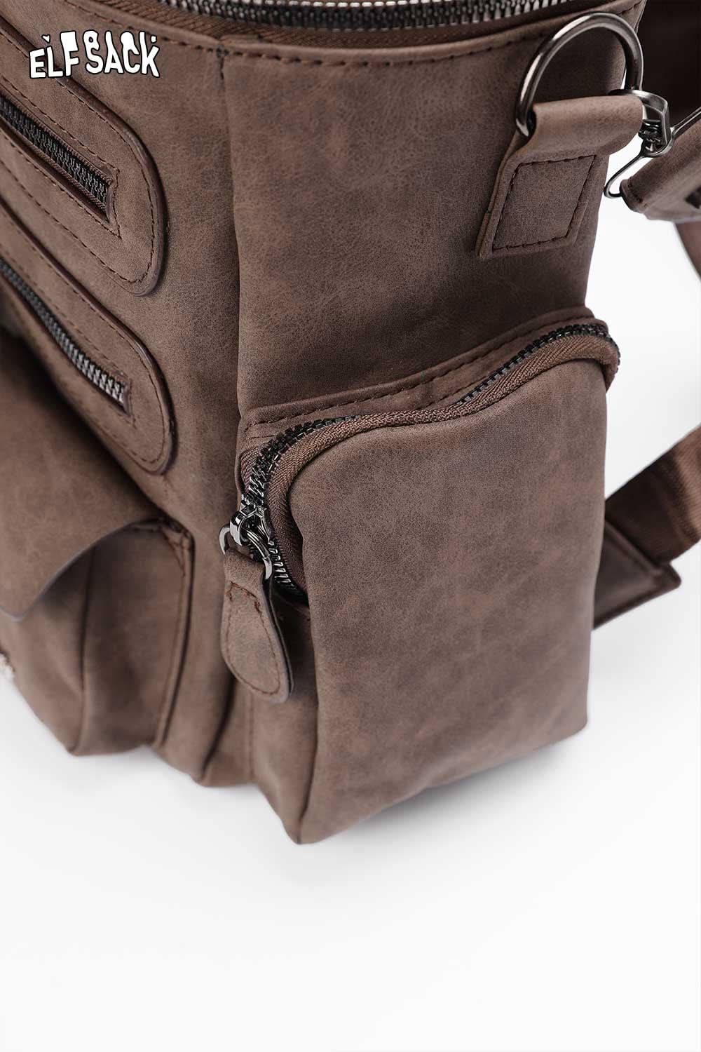 ELFSACK suede multi-compartment rucksack in brown with multiple zippered pockets for versatile storage