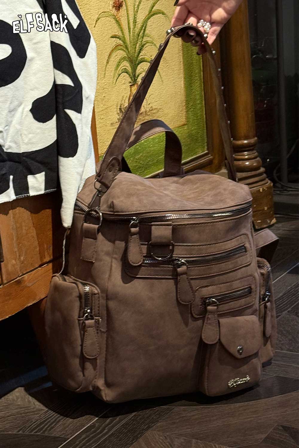 ELFSACK suede multi-compartment rucksack with multiple pockets for organized storage and stylish design