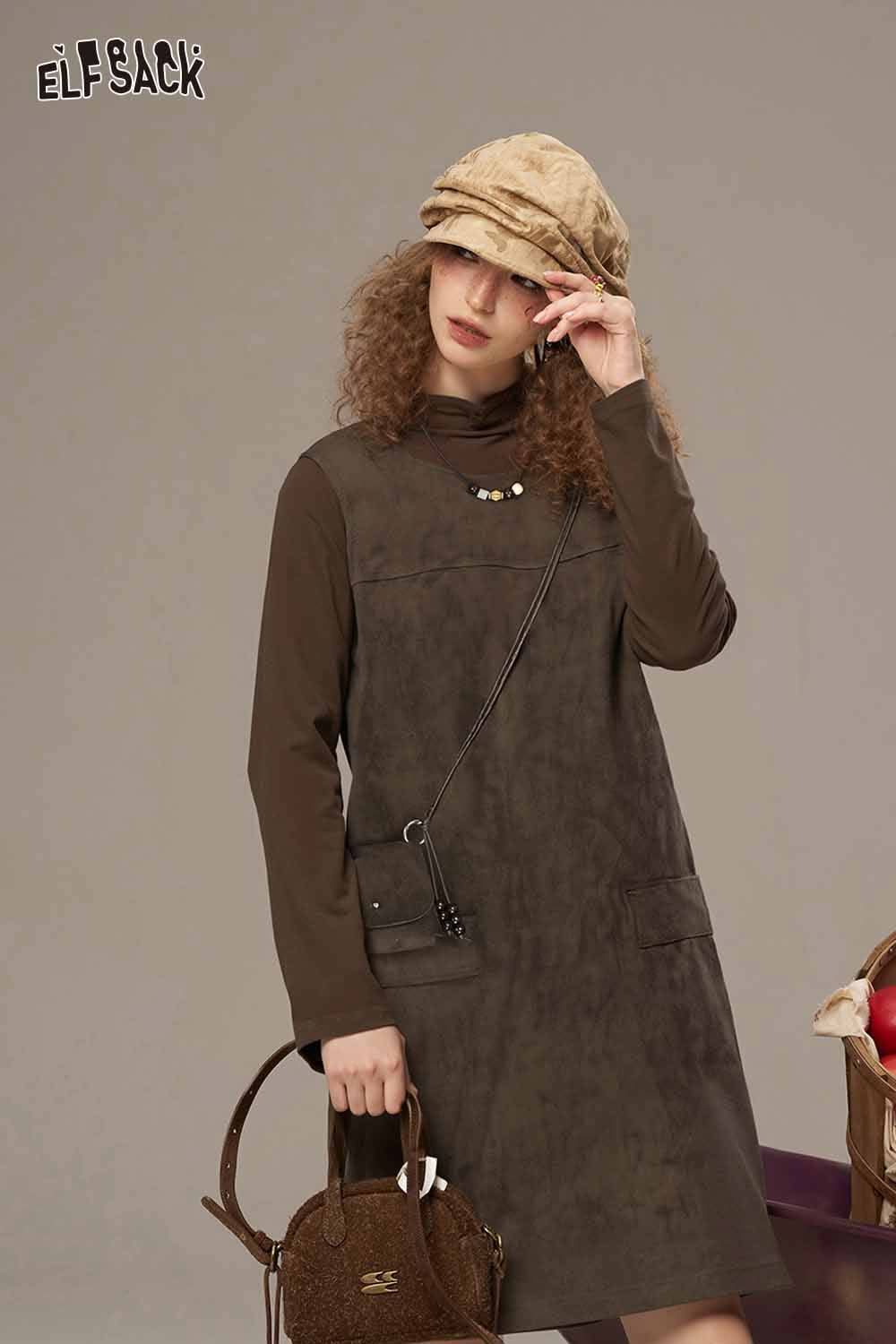 ELFSACK suede paneled turtleneck dress in brown with long sleeves and pockets, styled with a cap