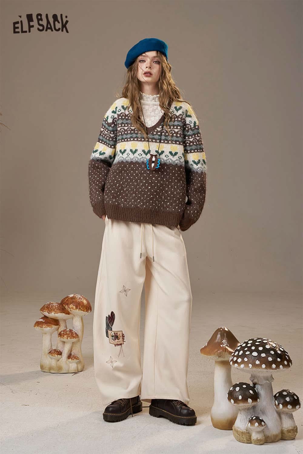 ELFSACK polka dot floral knit sweater in brown with colorful patterns paired with wide-leg pants
