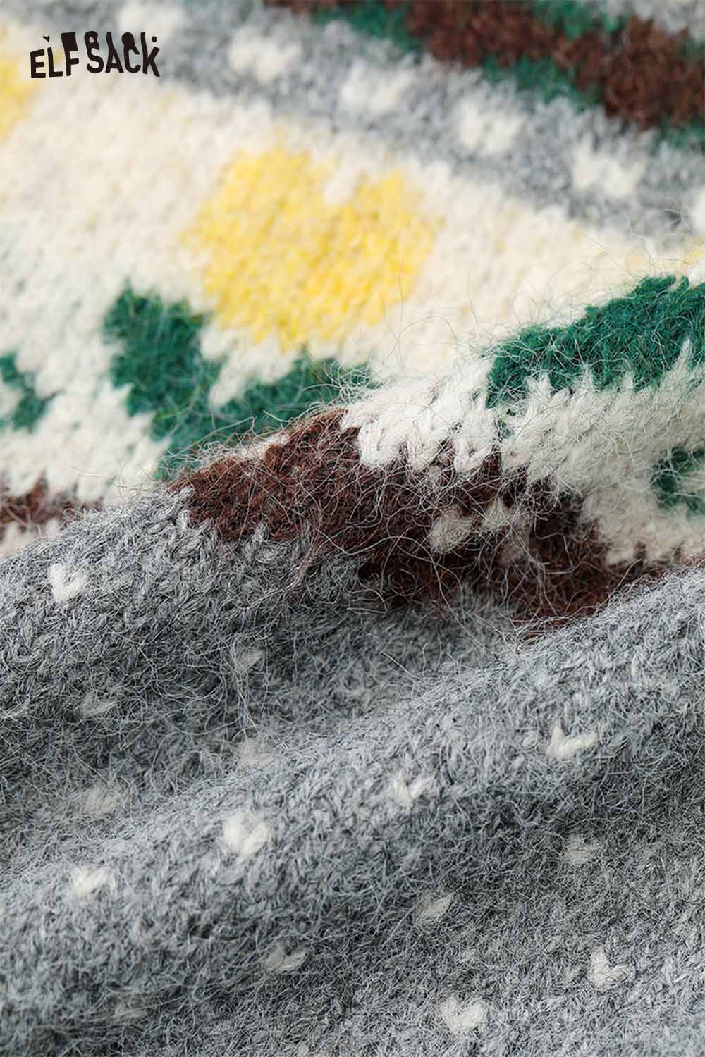 Close-up of ELFSACK polka dot floral knit sweater showcasing vibrant colors and texture