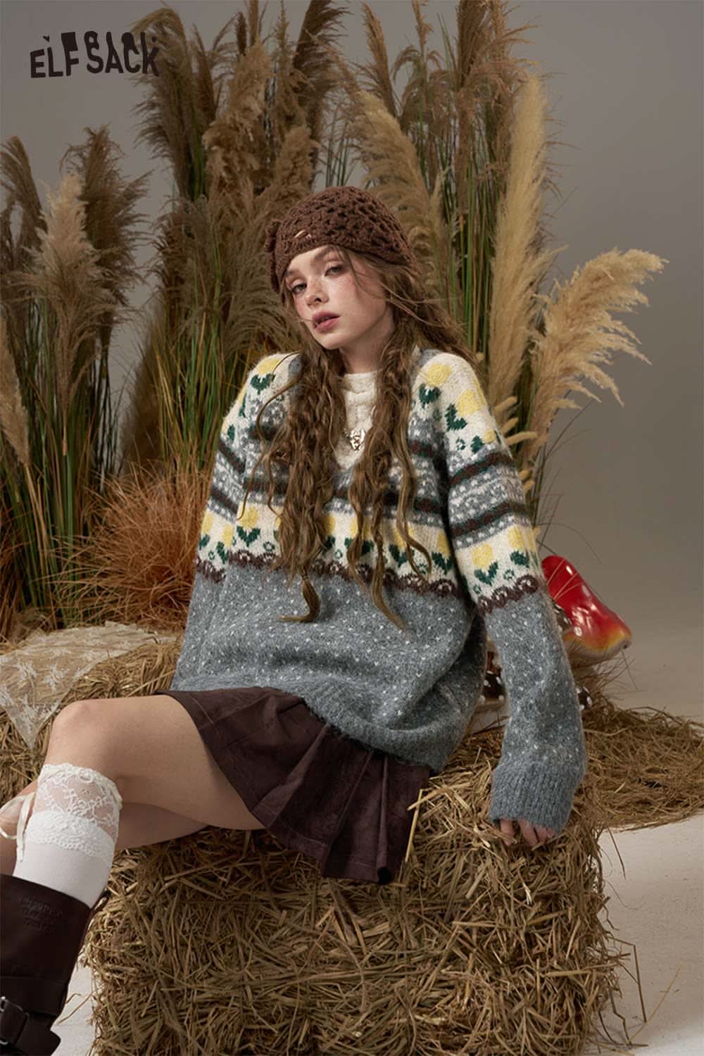 ELFSACK polka dot floral knit sweater in gray with colorful patterns, styled with a brown skirt