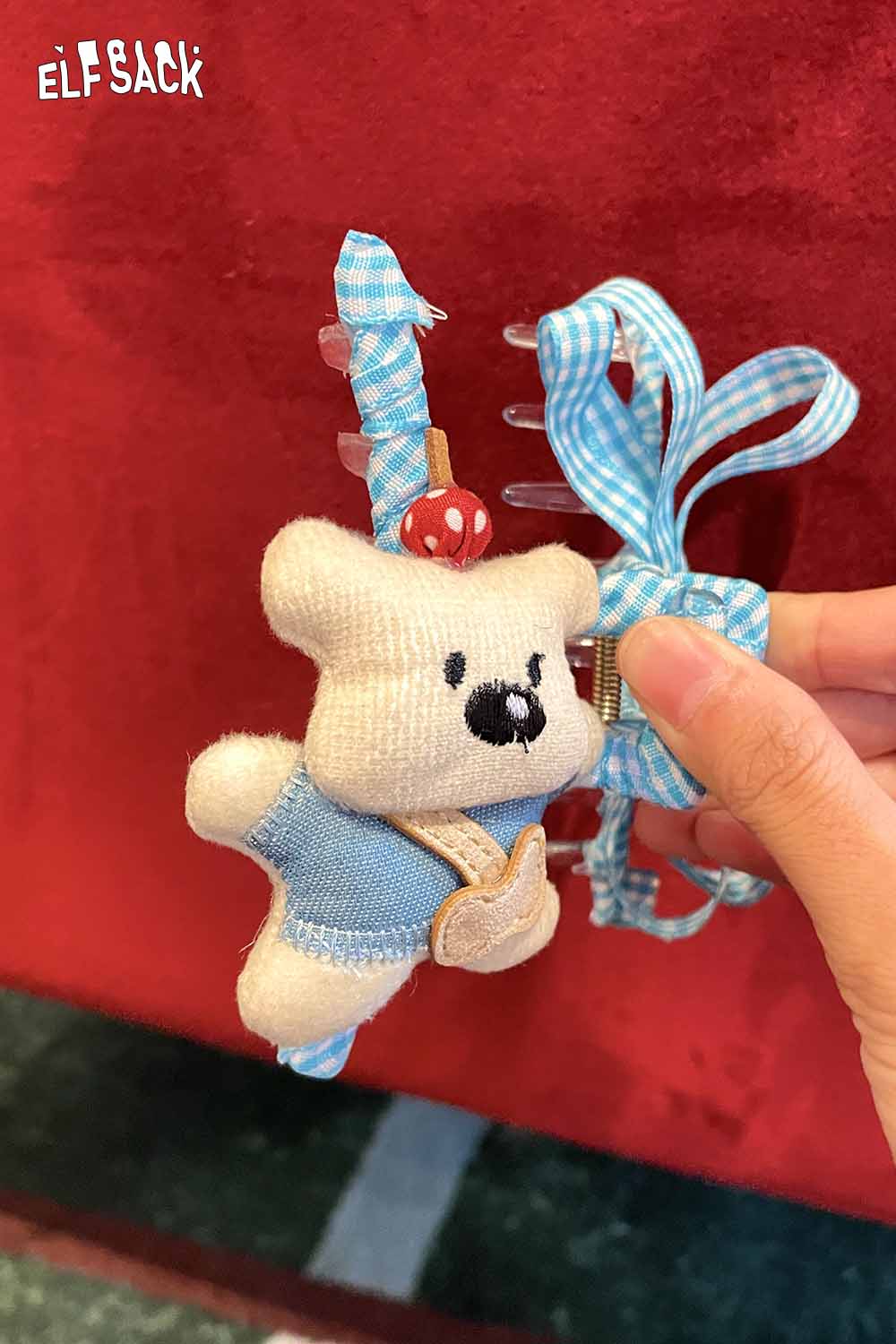 ELFSACK teddy bear hair clip with a blue checkered ribbon and cute bear design for stylish accessories