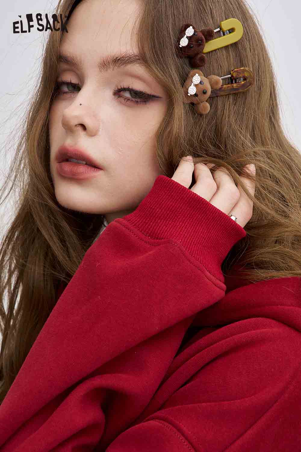 ELFSACK teddy bear hair clips in brown on model's hair for a cute, trendy accessory look