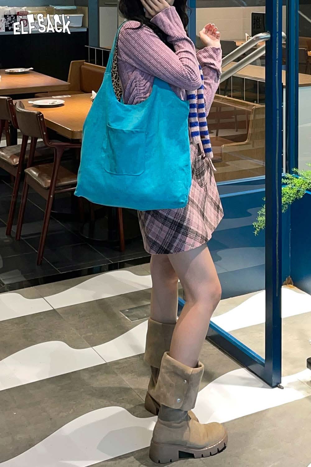 Textured oversized hobo bag in turquoise, perfect for casual outings with stylish outfits