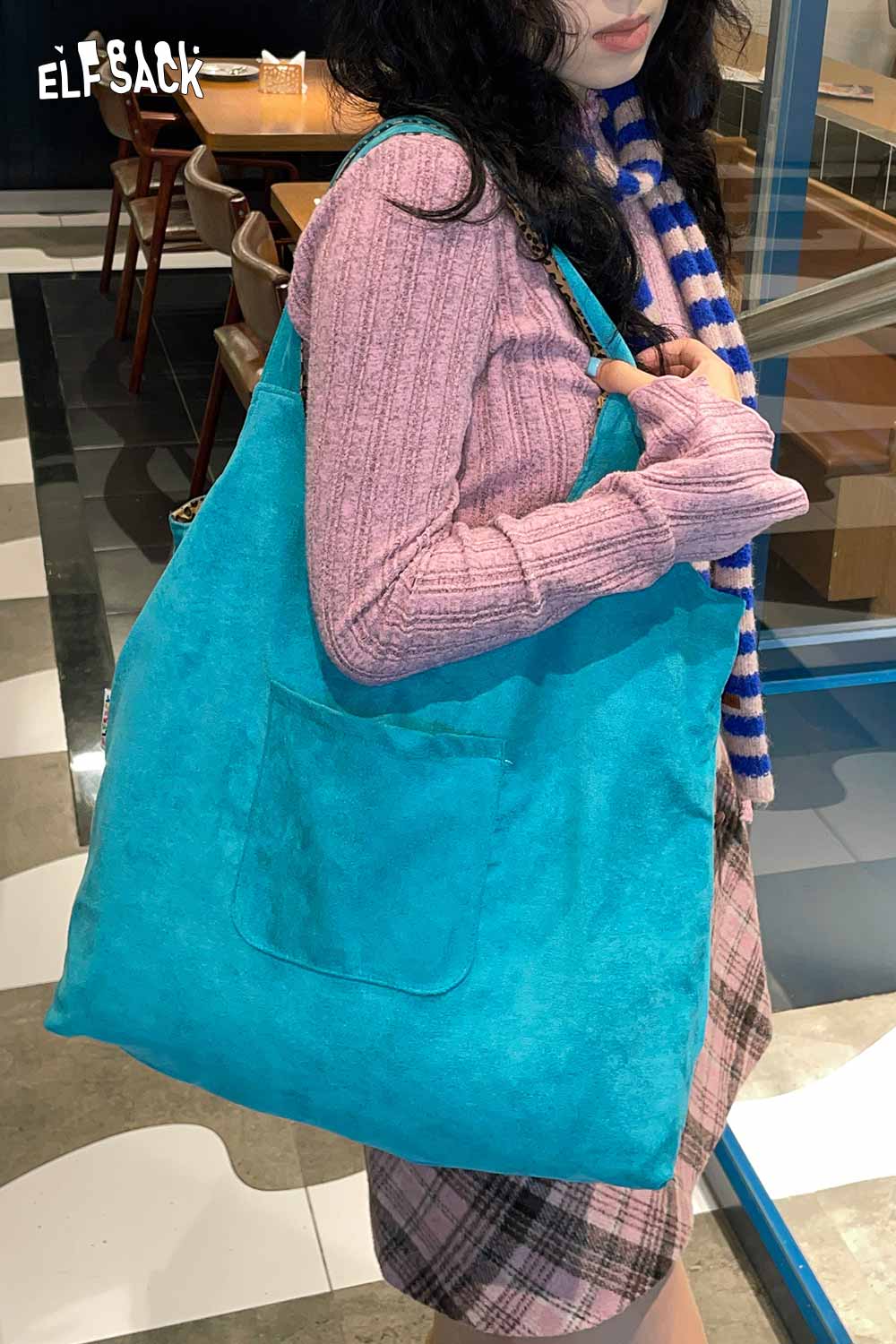 ELFSACK textured oversized hobo bag in vibrant turquoise with a front pocket for versatile styling