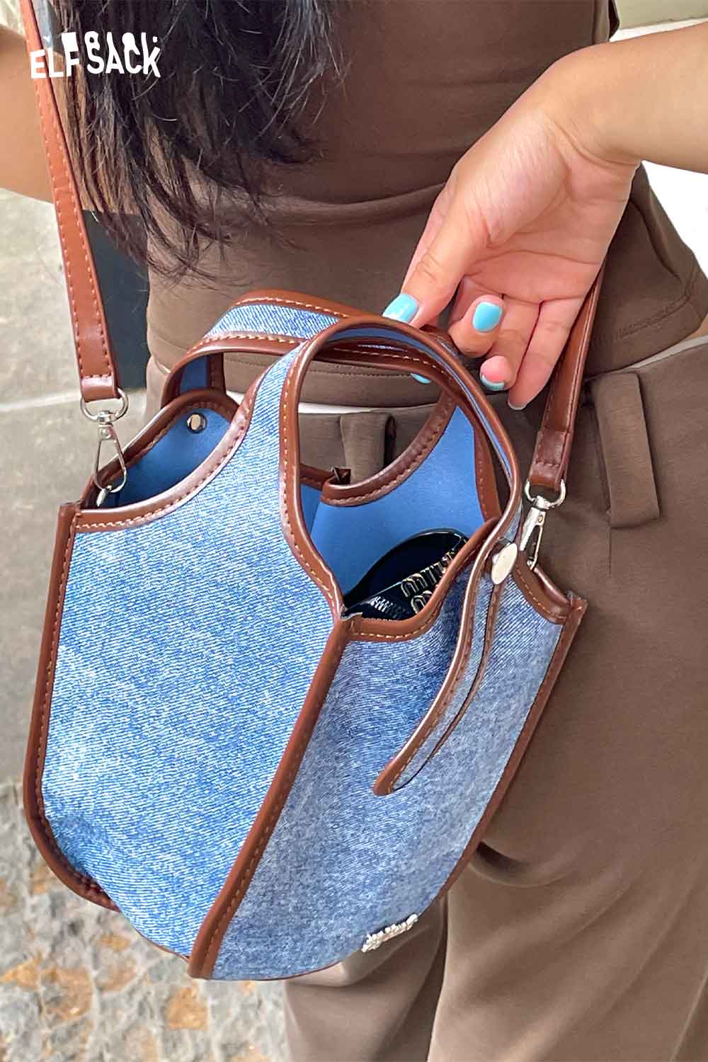 ELFSACK upcycled denim crossbody bag with brown accents and stylish handle for casual outings