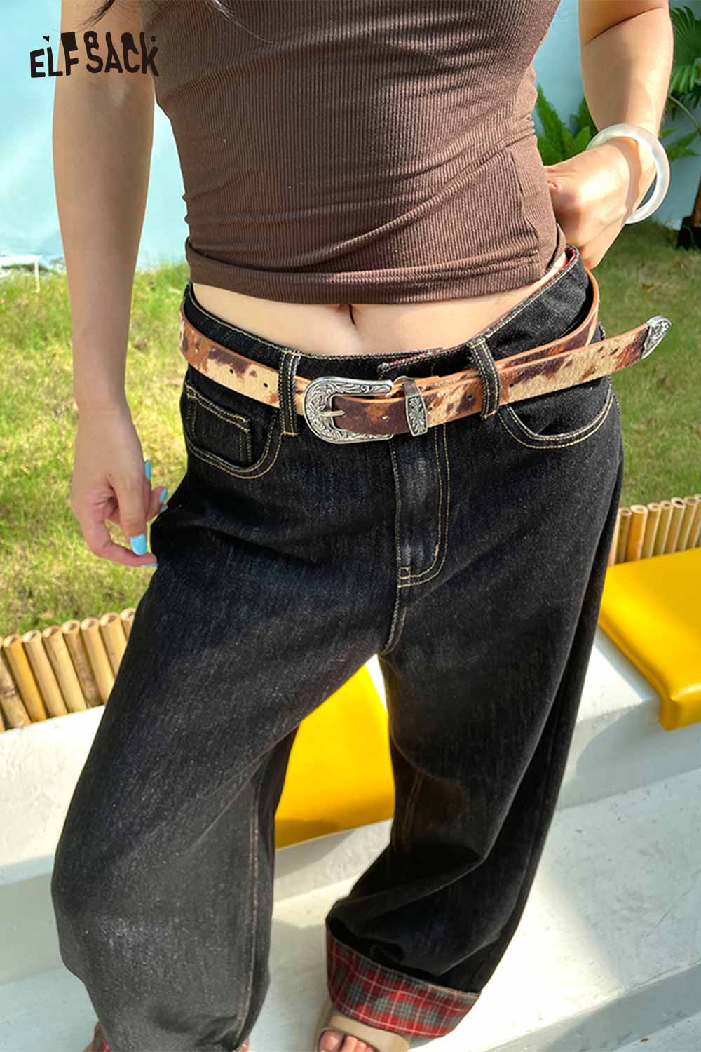 ELFSACK vegan leather cowhide pattern belt styled with relaxed fit dark jeans