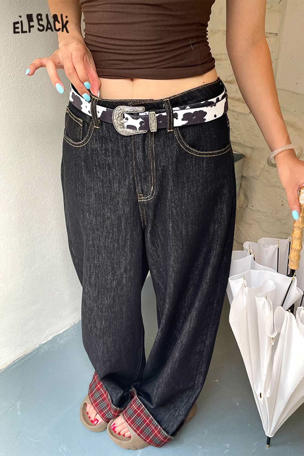 ELFSACK vegan leather cowhide pattern belt styled with loose black denim jeans for a trendy look