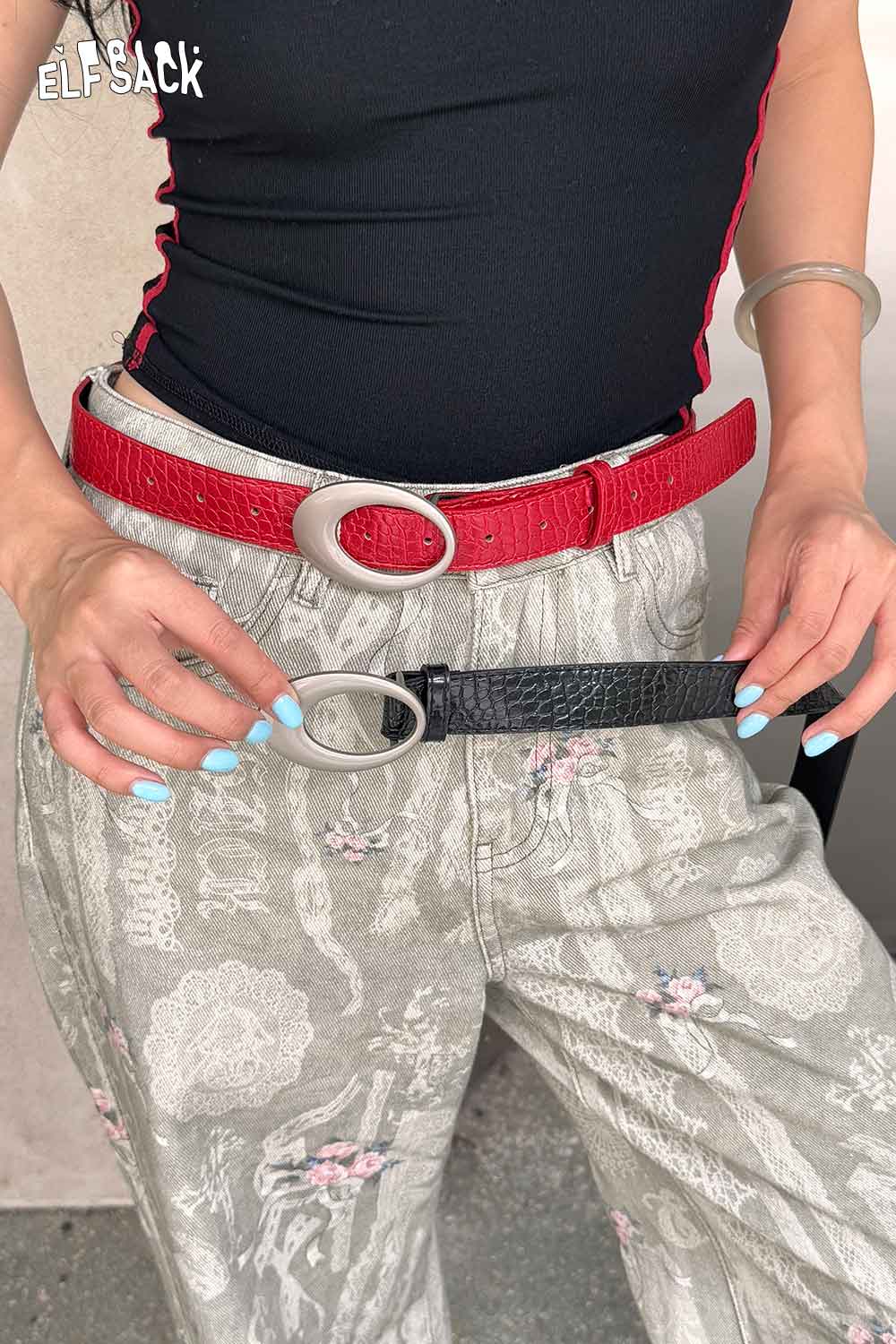 ELFSACK vegan leather croc-embossed belt in black and red, styled with trendy high-waisted pants
