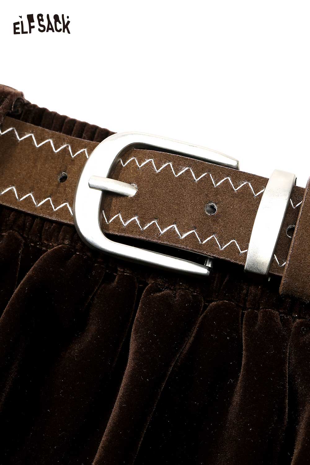 Close-up of a brown ELFSACK velvet short skirt for women with a stylish belt and stitching details