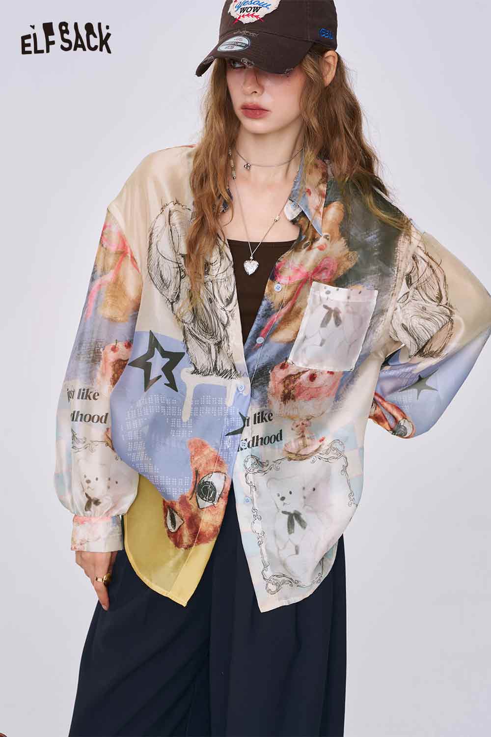 ELFSACK women all over print long sleeve shirt oversized pastel collage print button front worn with cap and black pants