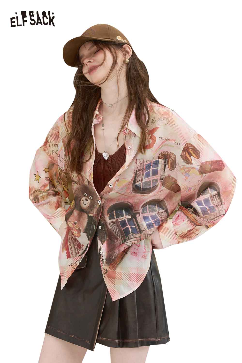 ELFSACK womens all over print long sleeve shirt in pastel pink with teddy and window collage styled with black skirt and cap