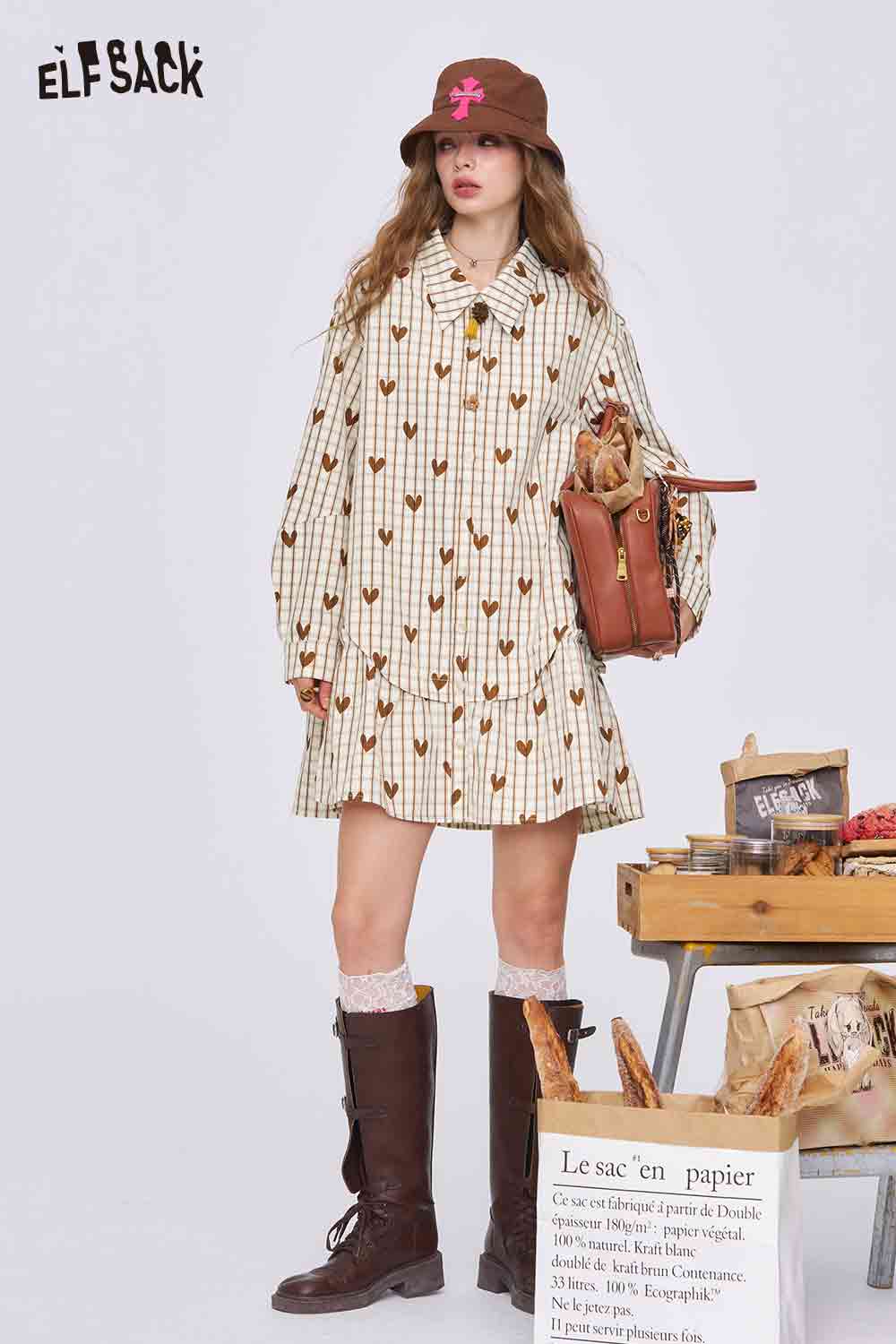ELFSACK college style heart plaid dress in cream with brown heart print ruffle hem long sleeves and brown boots