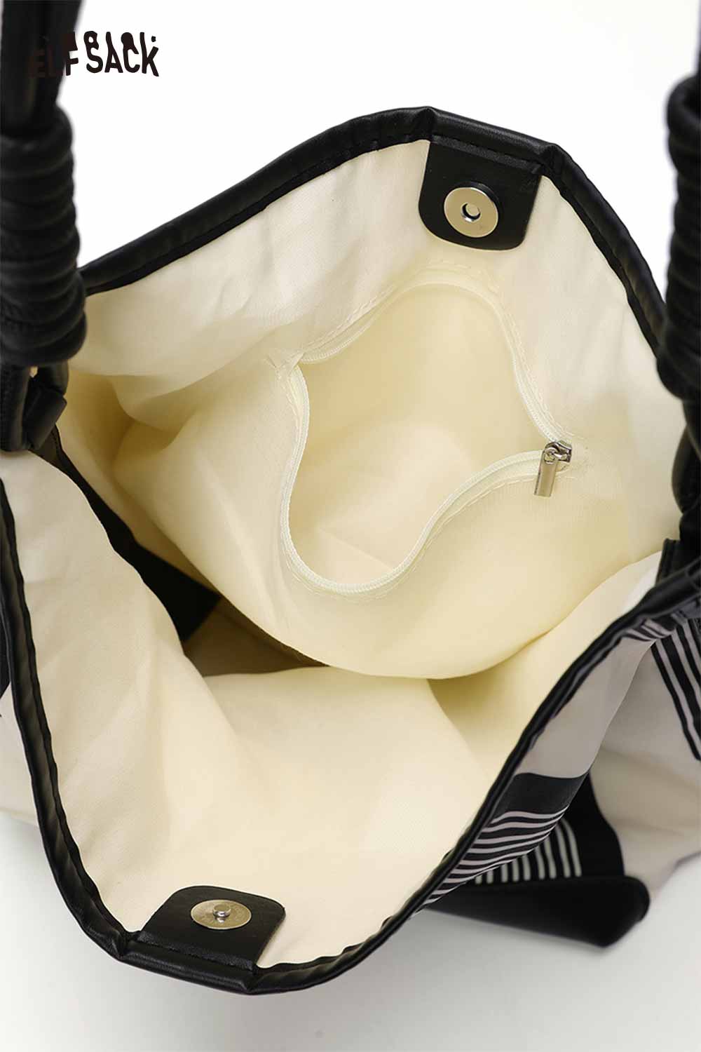 Inside view of the ELFSACK contrast stripe canvas tote bag featuring a spacious compartment and zip pocket