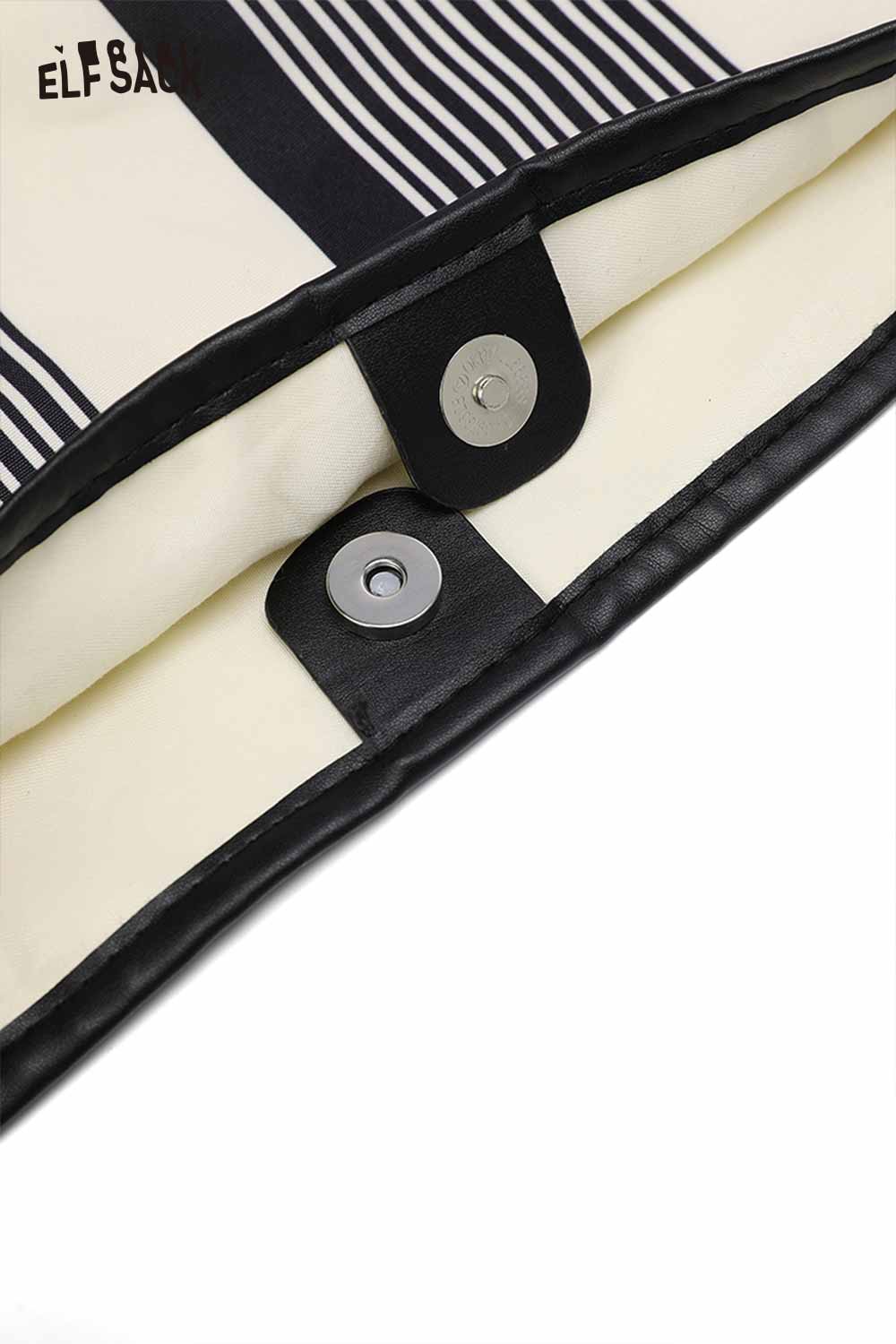 Interior view of ELFSACK contrast stripe canvas tote bag with snap closures and stylish design