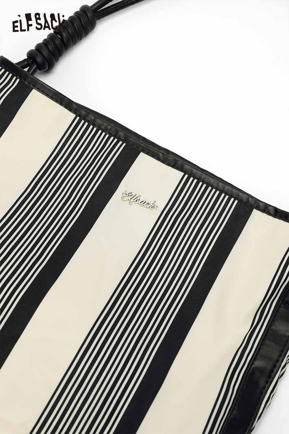 ELFSACK contrast stripe canvas tote bag featuring bold black and white stripes and a stylish design