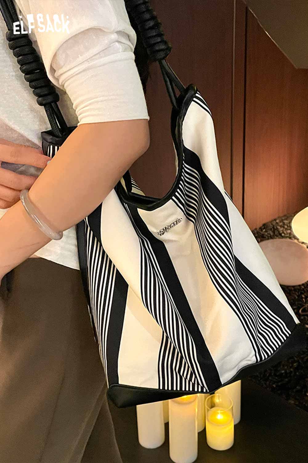 ELFSACK contrast stripe canvas tote bag featuring bold black and white stripes for a stylish look