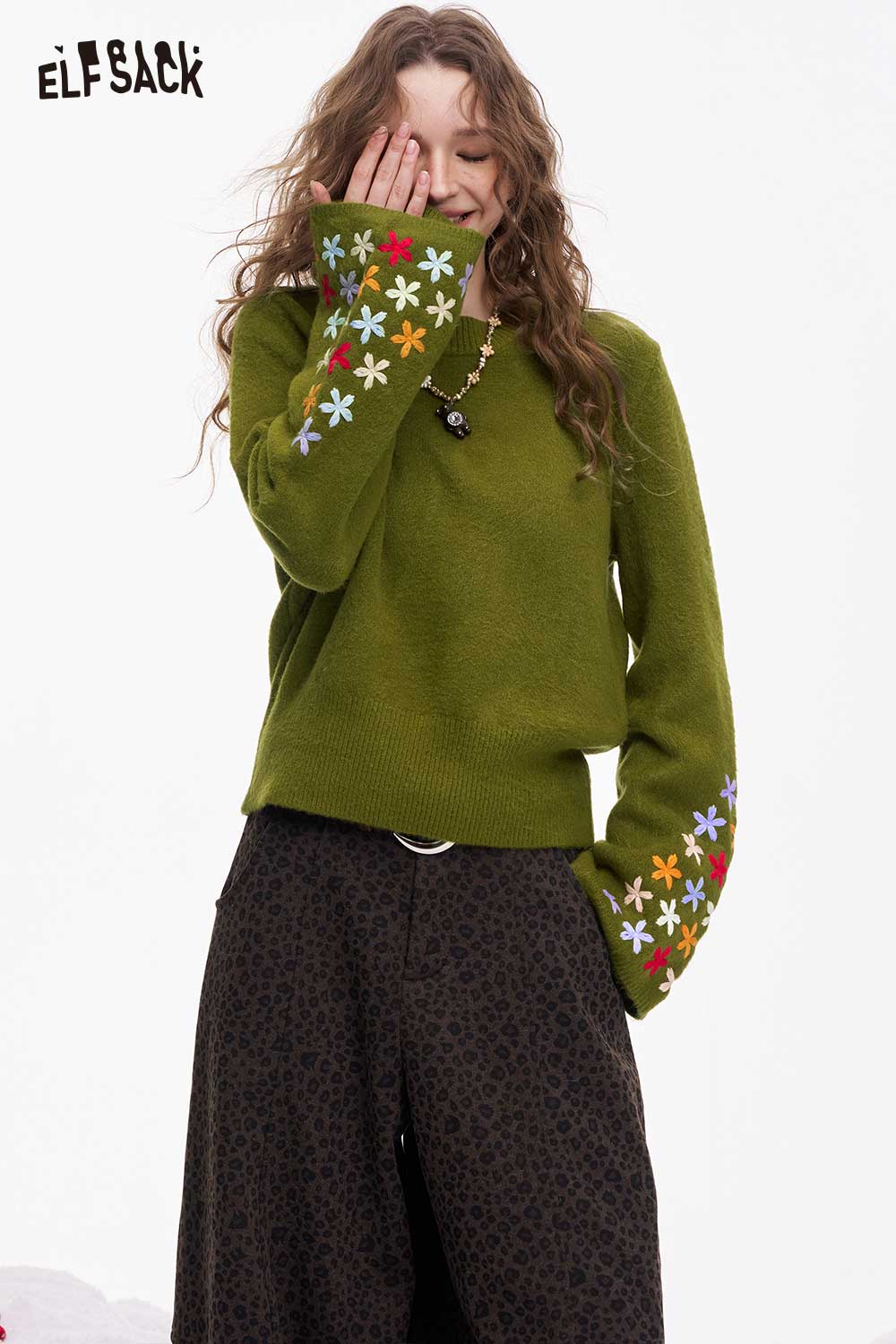 ELFSACK cropped floral sleeve sweater in green with colorful floral designs on sleeves