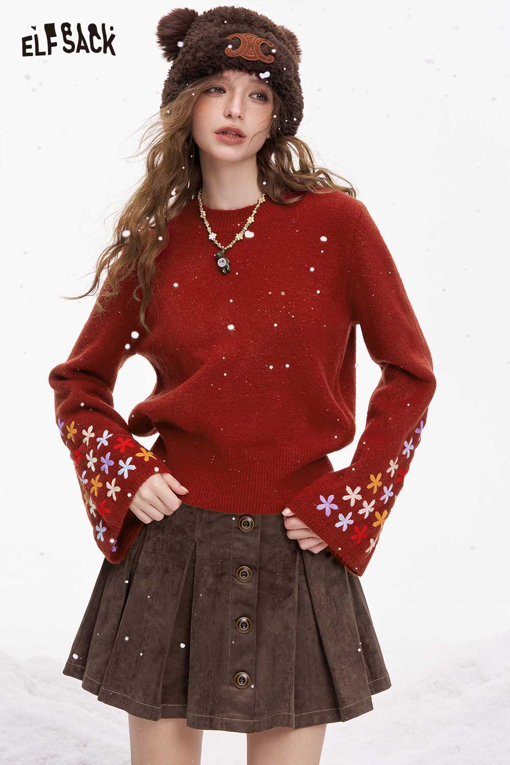 Red ELFSACK cropped floral sleeve sweater with colorful flower designs on bell sleeves