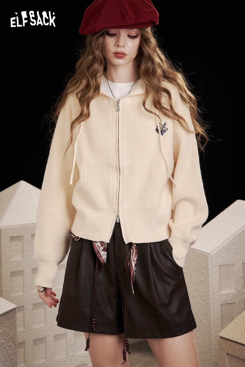ELFSACK crown embroidered knit sweater in cream with a zip front and relaxed fit for stylish comfort